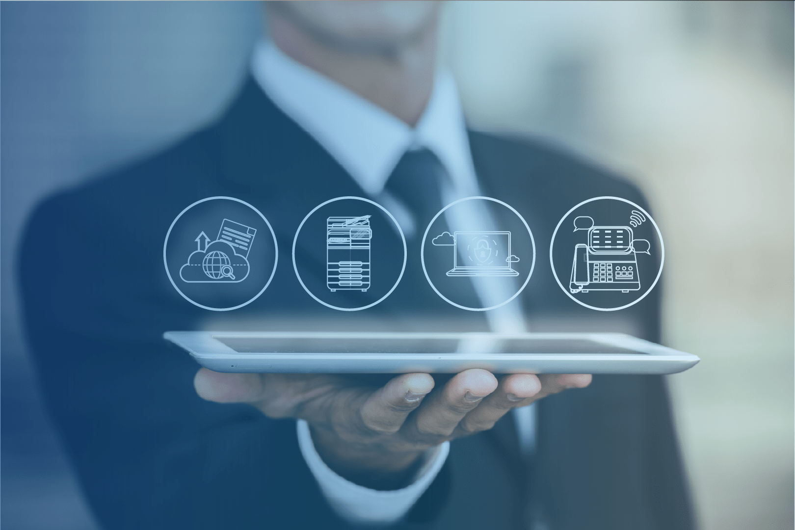 a person holding a tablet with the service icons on top of it.